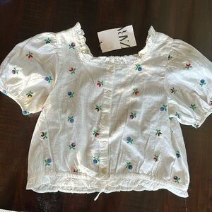 Zara girls size 9, short sleeve floral top.  New with tags